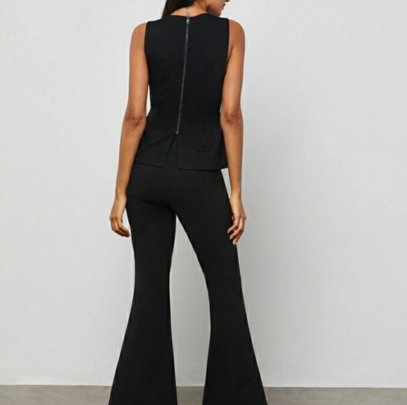 🌱 BCBGMaxAzria Faux Leather Sleeveless Peplum Top Black Sz XXS - Picture 9 of 10